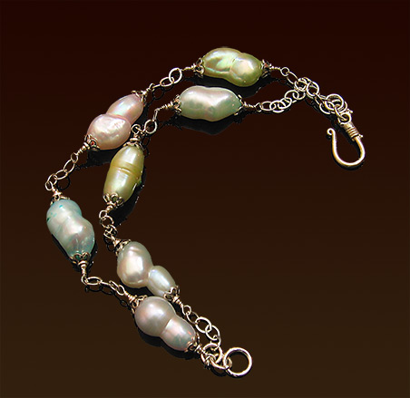 Pastel colors freshwater pearls on sterling chain bracelet, hook and eye clasp