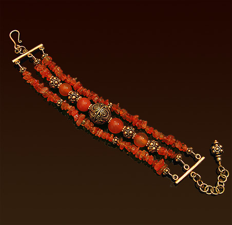 Three strands carnelian gemstones and vermeil Bali beads bracelet, hook and eye clasp