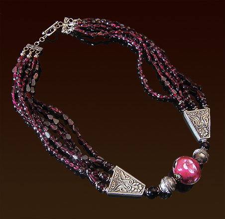 One of a kind lampwork glass bead necklace, Balinese silver beads and toggle clasp, six strands garnet stones collar