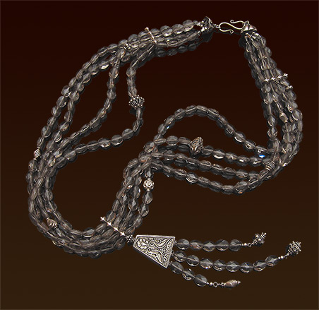 Four strands faceted smoky quartz necklace, 24", Balinese silver focal and accent beads, sterling clasp, 5" pendant