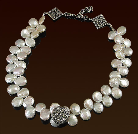 White freshwater coin pearls, sterling focal repousse' button, sterling hook & eye clasp