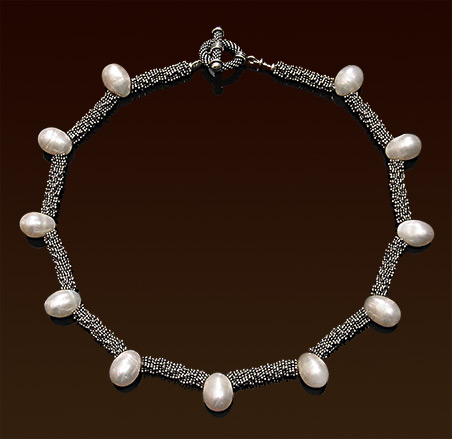 Oblong white freshwater pearls, Balinese silver spacers and toggle clasp choker