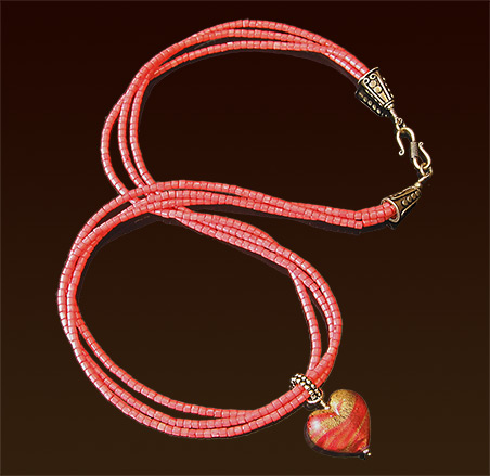 Three strands dyed coral necklace, gold foil venetian glass heart pendant, vermeil slider and S clasp