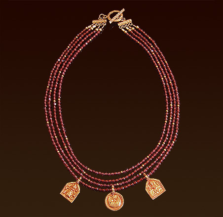 Four strands light garnet necklace, Balinese vermeil pendants and toggle clasp